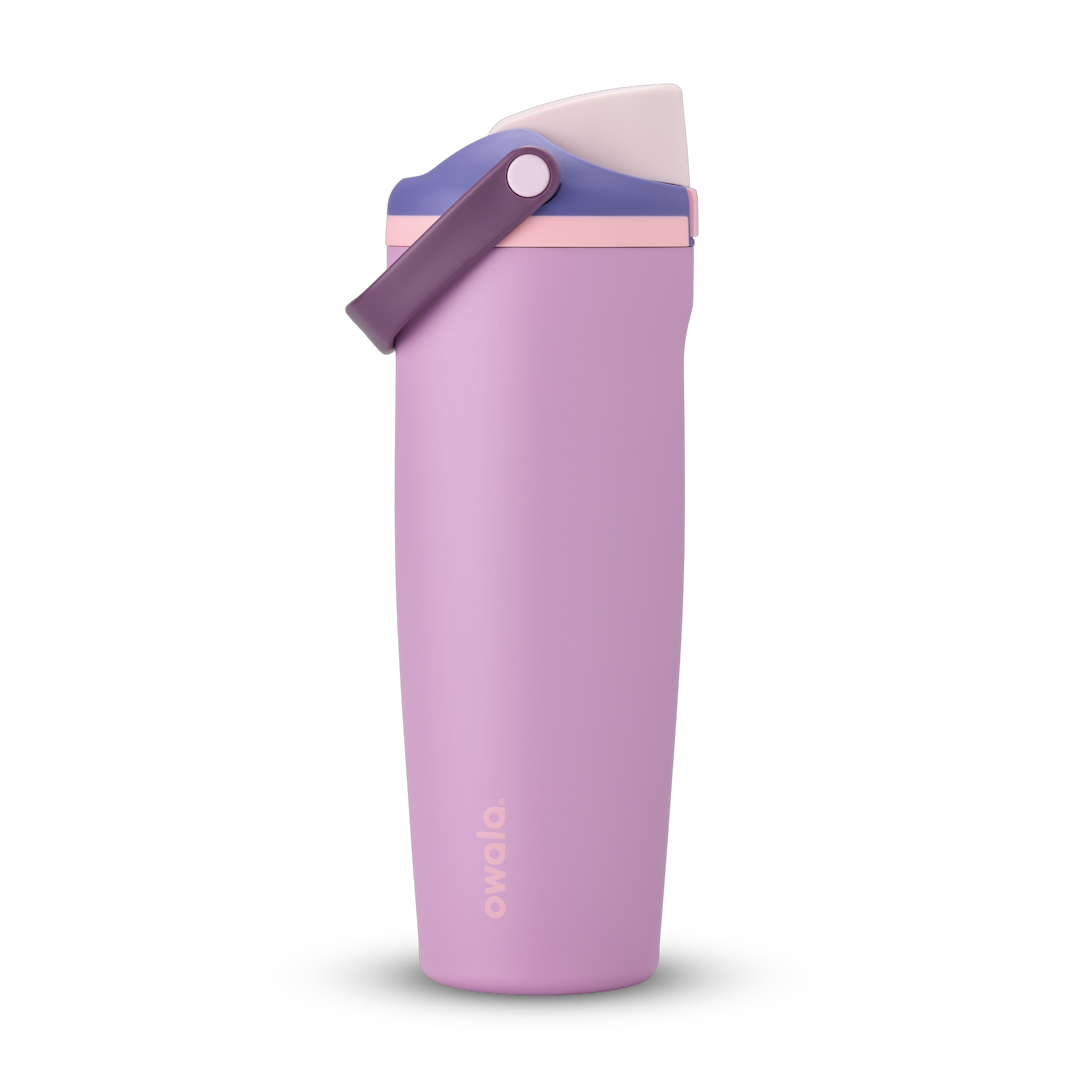 FreeSip Sway 32oz in Pretty in Purple, soft pink insulated water bottle with violet purple flip cap, deep purple carry loop and pale pink accent, lid open