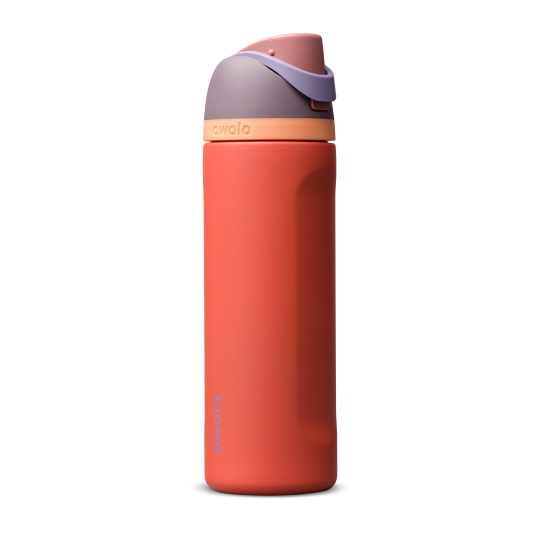 FreeSip 24oz in Terracotta Sunset, warm terracotta orange insulated bottle with muted mauve purple flip cap and peach accent band