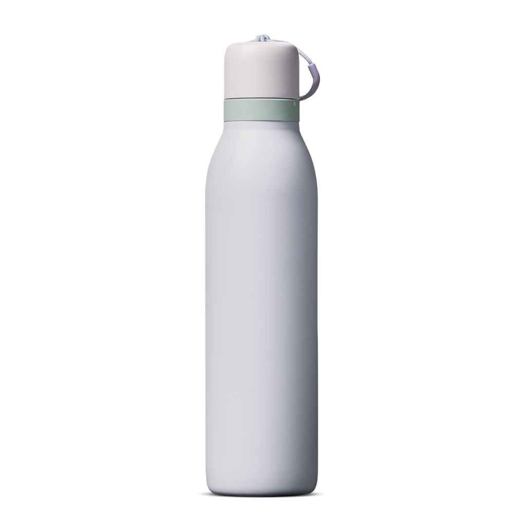 FreeSip Twist 24oz in Open Air (soft light grey-blue) with a pale mint green accent band and white loop, shown