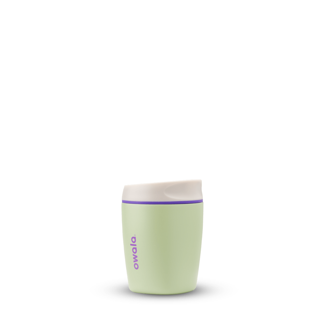 SmoothSip 10oz in Hip Cactus, light olive green tumbler body with cream flip-style lid, slim purple accent ring, and purple Owala logo